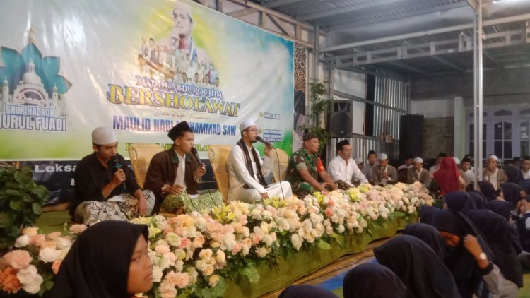 Tingkatak Ukhuwa Islamiyah Babinsa Hadiri Peringatan Maulid Nabi Muhammad SAW Di Madin Abdurohim
