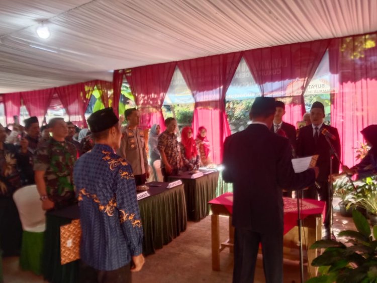 Babinsa Menghadiri Kegiatan Pengambilan Sumpah Dan Pelantikan Perangkat